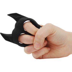 A hand gripping a pair of black hand grips for SEO purposes at home.