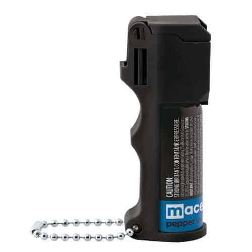 A Mace® Pocket Model Triple Action black pepper spray with a chain attached to it, perfect for on-the-go self-defense as a small Pocket Model with the added benefit of Mace protection.