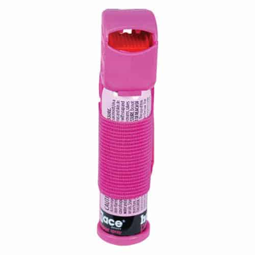 A Mace® Pepper Spray Jogger - Pink spray bottle with a red handle containing Mace® Pepper Spray Jogger - Pink.