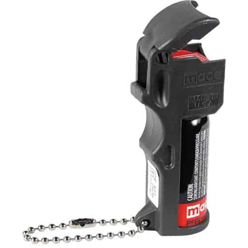 A black handgun with a chain attached to it, perfect for pocket carry and equipped with Mace® PepperGard Pocket Pepper Spray for self-defense.