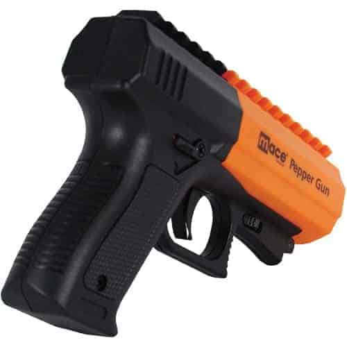 A black and orange Mace® Brand Pepper Gun 2.0 with an orange handle.