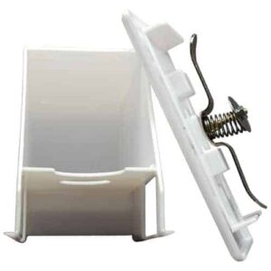 A white plastic holder with a spring attached to it, designed as a Wall Socket Diversion Safe.
