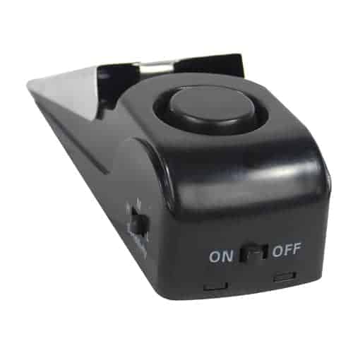 A super black Super Door Stop Alarm with an on and off button.