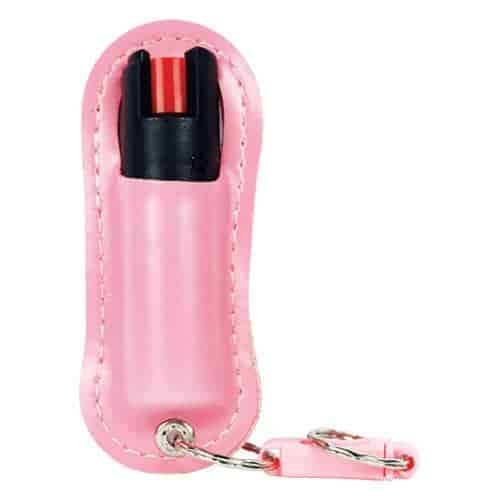 A pink Pepper Shot 1.2% MC ½ oz Halo Holster key ring with a Pepper Shot canister attached to it.