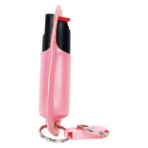 A pink key ring with a pink fire extinguisher is enhanced with the Pepper Shot 1.2% MC ½ oz Halo Holster, providing both style and security.