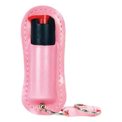 A pink key chain with a key ring attached to it, perfect for carrying a Pepper Shot 1.2% MC ½ oz Halo Holster.
