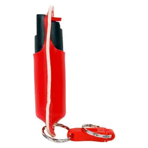 A red fire extinguisher with a Pepper Shot 1.2% MC ½ oz Halo Holster key chain.