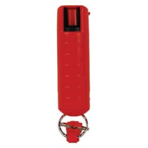 Description: A red plastic whistle on a white background with a Pepper Shot 1.2% MC 1/2 oz Pepper Spray Hard Case Belt Clip and Quick Release Key Chain.