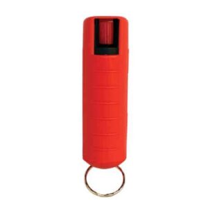 A red Pepper Shot 1.2% MC 1/2 oz Pepper Spray Hard Case Belt Clip and Quick Release Key Chain ignited with a key ring.