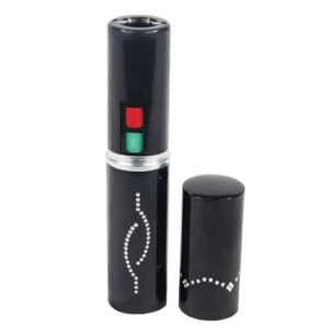 A rechargeable black makeup brush with a red and green button, now featuring a built-in flashlight.