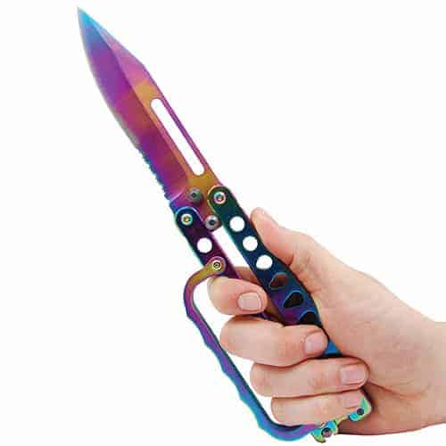 A person holding a Butterfly Trench Knife Plasma with a rainbow colored handle, reminiscent of the vibrant hues of plasma.