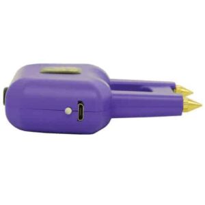 A purple portable charger with a Spike Stun Guns attached to it, giving it a stylish and edgy look.