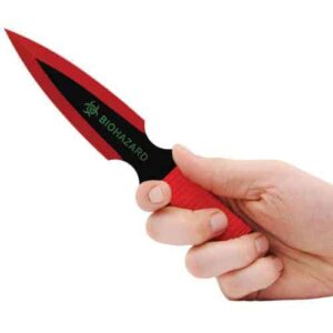 A hand gripping the 2 Piece Throwing Knife Red Color BioHazard prominently featuring red and black colors.