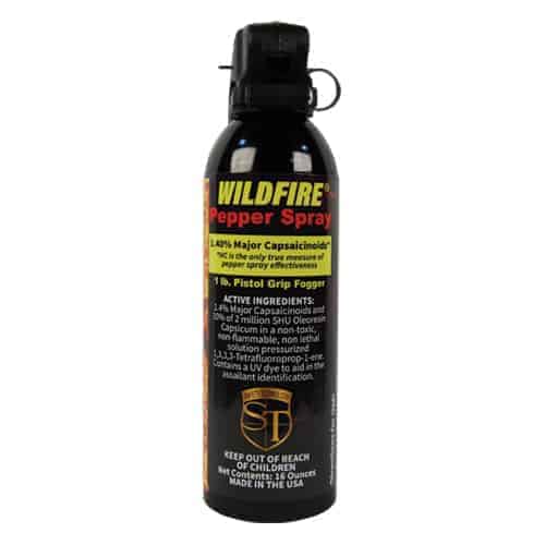 A bottle of Wildfire™ 1.4% MC Pepper Spray Fogger on a white background.