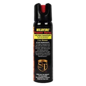 The WildFire spray, with a 1.4% MC concentration, is shown emitting a pepper spray stream on a white background.