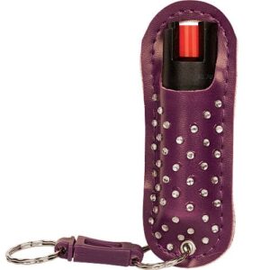 A purple key holder with studs on it, featuring the WildFire™ 1.4% MC 1/2 oz Halo Holster.