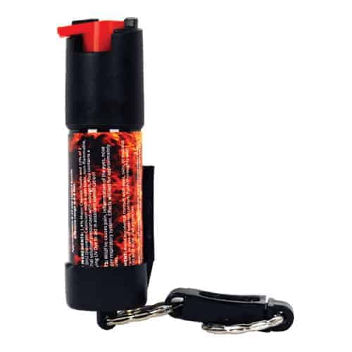 A Wildfire™ Pepper Spray With Belt Clip and Quick Release Key Chain with a key ring and a belt clip attached to it.