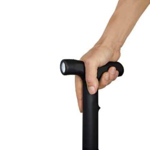 A person's hand holding a ZAP™ Stun Cane with Flashlight, a black walking stick equipped with a built-in flashlight.