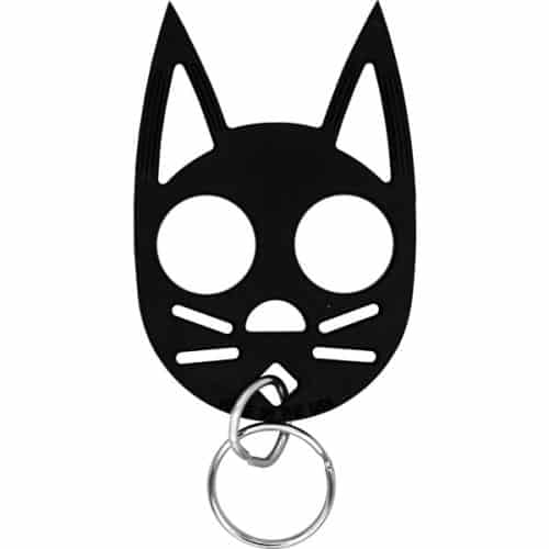 A Cat Strike Self-Defense Keychain with a hole in the middle, perfect for self-defense purposes.