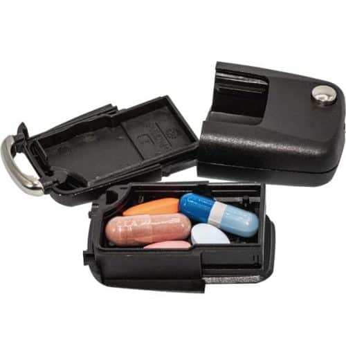 A black Car Key Diversion Safe with pill-shaped compartments, serving as a diversion safe for inconspicuous pill storage or transportation.