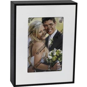 A black Photo Frame Diversion Safe featuring a picture of a bride and groom, doubling as a discreet diversion safe.