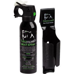 A GrizGuard Bear Spray, which is a bottle of GrizGuard Bear Spray, comes with a convenient holster for easy access and protection against bear encounters.