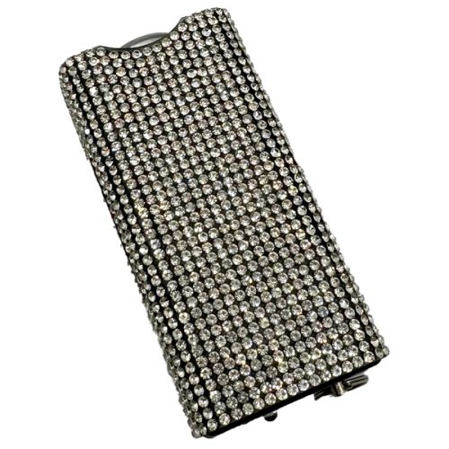 Adorned in shimmering rhinestones with a chic clasp, this rectangular clutch purse is the ultimate statement piece. Pair it perfectly with the Rhinestun Keychain Stun Gun for a complete, dazzling look.