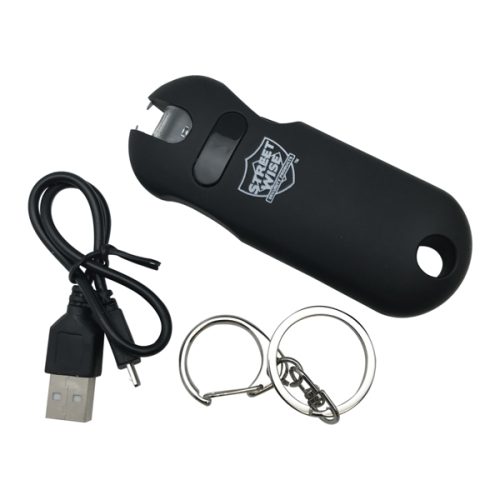 The SMART 24,000,000* Keychain Stun Gun in sleek black includes a charging cable and two metal key rings, combining power with compactness.