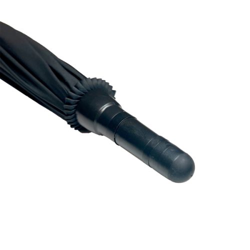 The Tactical Stunbrella, seen from the top when closed, boasts a black design with a sleek rounded handle, ideal for all weather and situations.